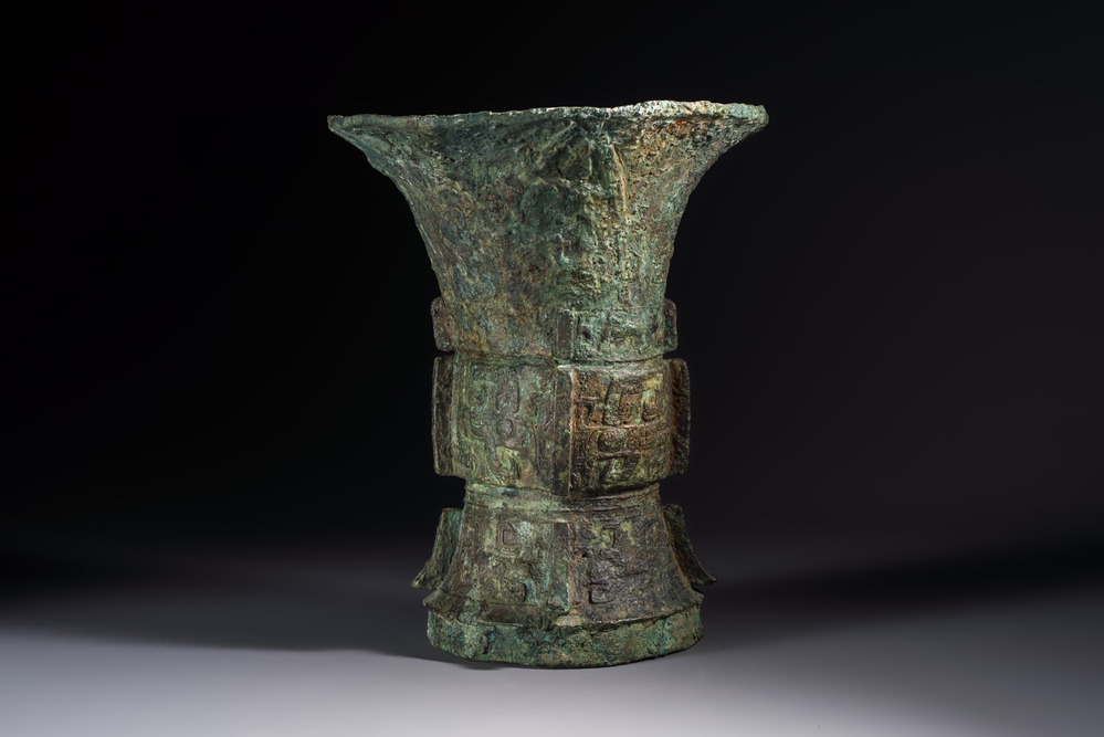 A Chinese archaic bronze ritual wine vessel with Taotie design, 'Zun 尊', Shang