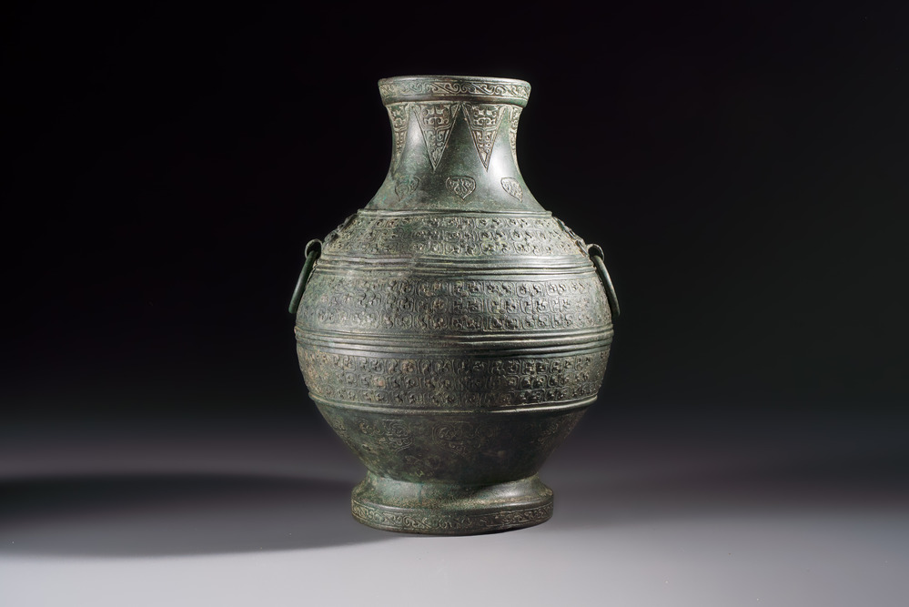 An extremely rare Chinese archaic bronze wine vessel, 'Hu 壺', Warring States period