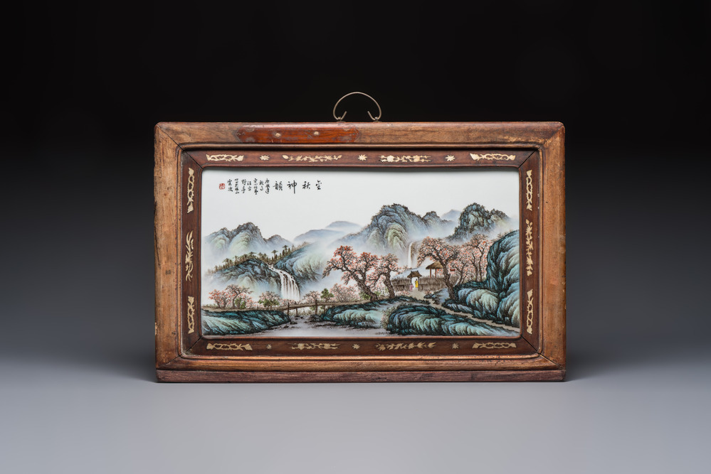 A framed Chinese famille rose 'Mountainous Landscape' plaque, after Wang Yeting 汪野亭, 20th C.