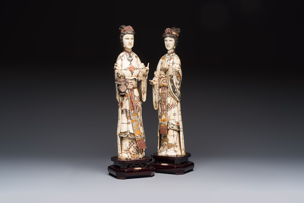 A pair of Chinese polychromed carved bone figures of divinities, 20th C.
