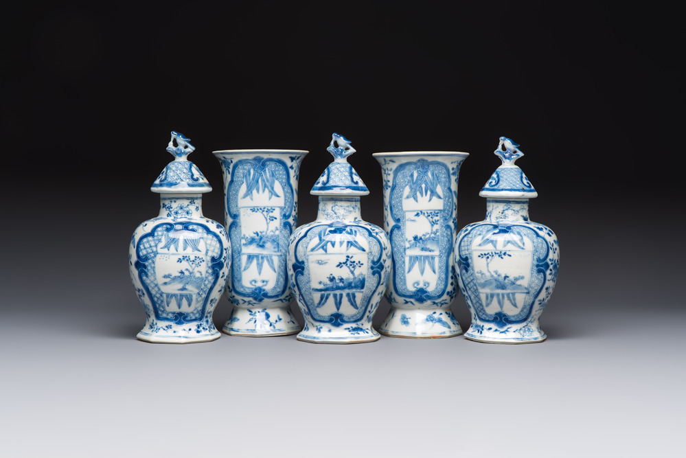 A rare Chinese blue and white five-piece garniture in Dutch Delft style, Kangxi mark, 19th C.