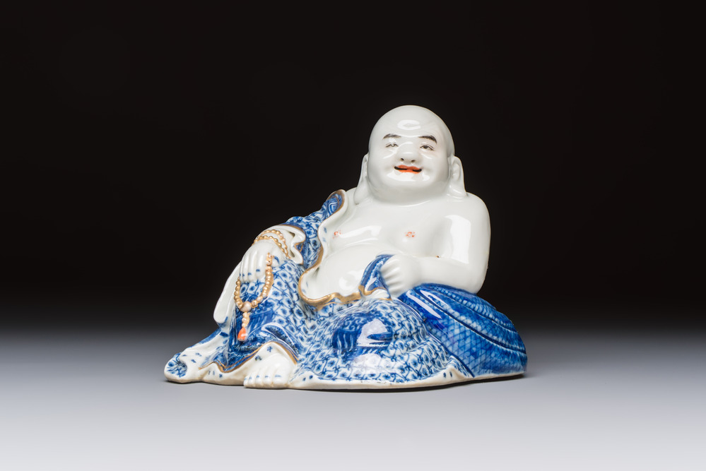 A Chinese blue and white, iron-red and gilt-decorated Milefo Buddha, Fu Jian Hui Guan 福建會館 and You Lin Ji Zhi 游林記製 marks, 20th C.