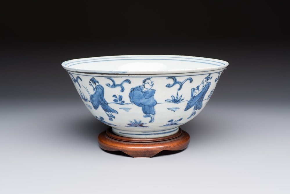 A Chinese blue and white 'Eight Immortals' bowl on a wooden stand, Chenghua mark, late Ming