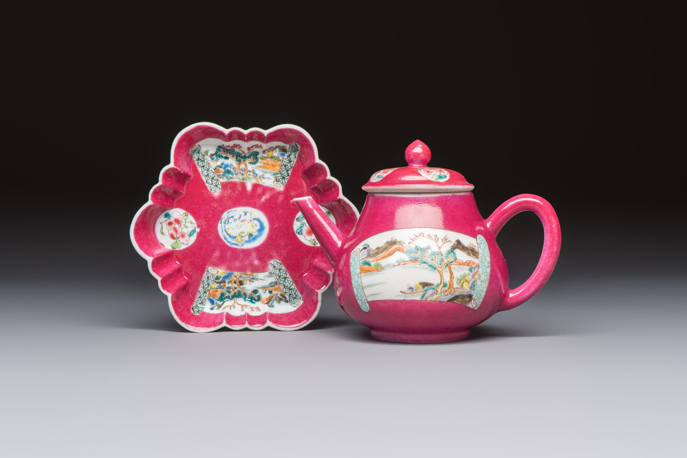 A Chinese famille rose ruby-ground 'Landscape Scroll' teapot and stand, Yongzheng