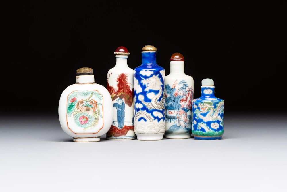 Five Chinese copper-red, blue and white, and polychrome snuff bottles, Yongzheng and Daoguang marks, 19/20th C.