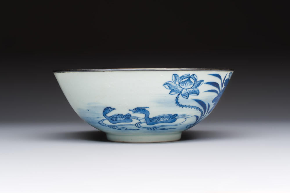 A Chinese blue and white 'Bleu de Hue' bowl with mandarin ducks in a lotus pond and a poem, Ngoan Ngoc 玩玉 mark, 19th C.
