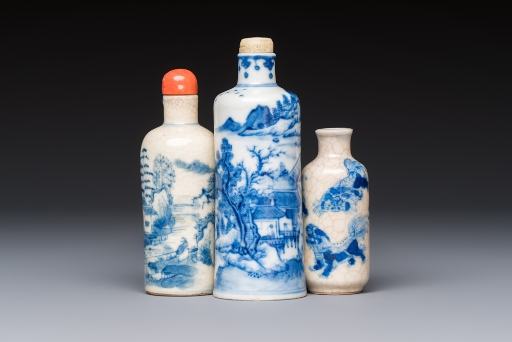 Three Chinese blue and white snuff bottles with landscapes and 'Buddhist Lions', Yongzheng marks, 19th C.