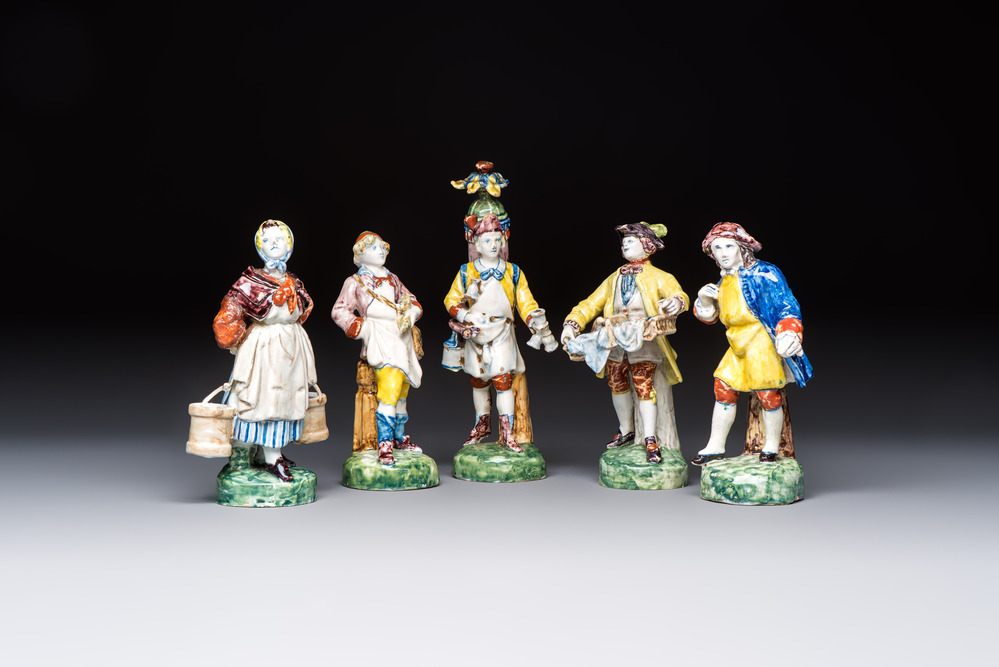 Five polychrome Delftware models of figures from everyday life, probably Desvres, France, 19th C.