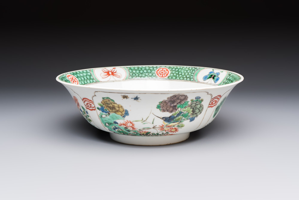 A Chinese famille verte bowl with bird and butterflies among flowers, lozenge mark, Kangxi