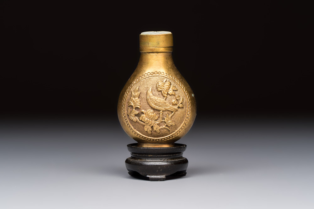 A Chinese gilt-bronze and mother-of-pearl-inlaid snuff bottle with birds among flowering branches, Guangxu mark and of the period