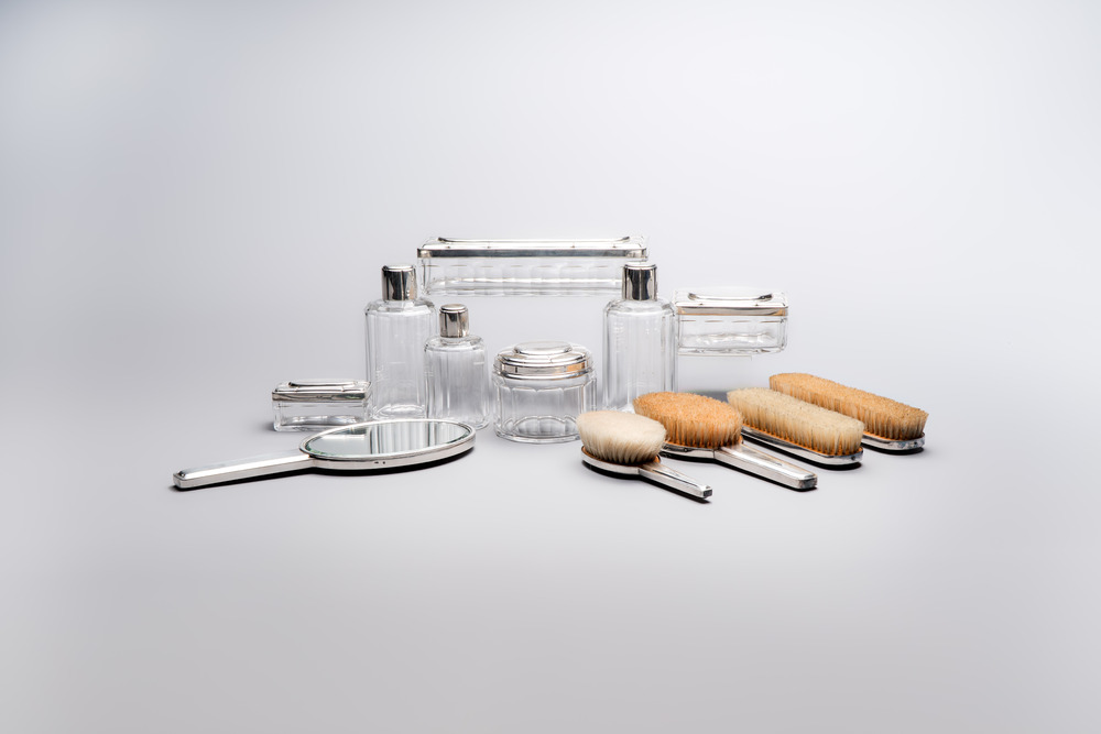 An Art Deco 12-piece silver toiletry set, Wolfers Fr&egrave;res, Brussels, 20th C.