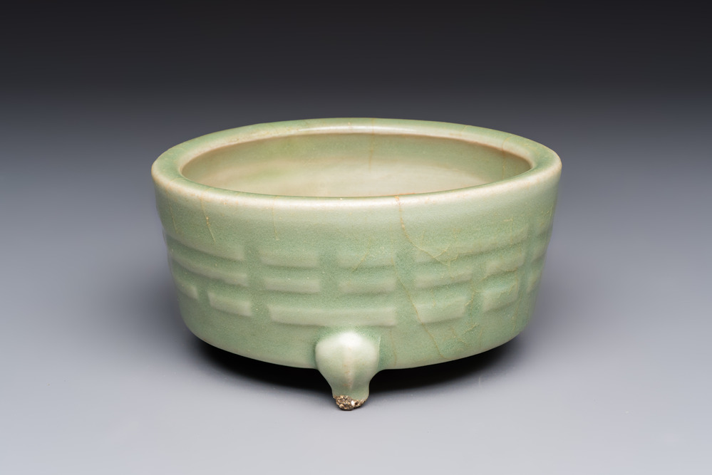 A Chinese Longquan celadon 'Bagua' tripod censer, Ming