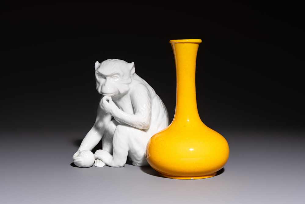A Japanese Awaji yellow-glazed vase and a white-glazed 'Monkey' group, 19/20th C.