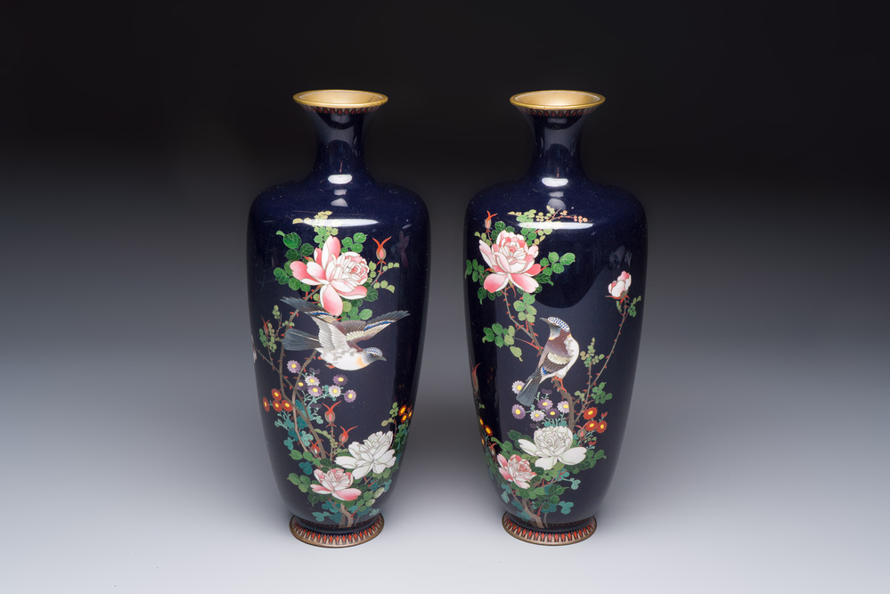 A pair of Japanese silver-wired cloisonn&eacute; enamel vases with birds among flowering branches, Meiji period, 19th C.