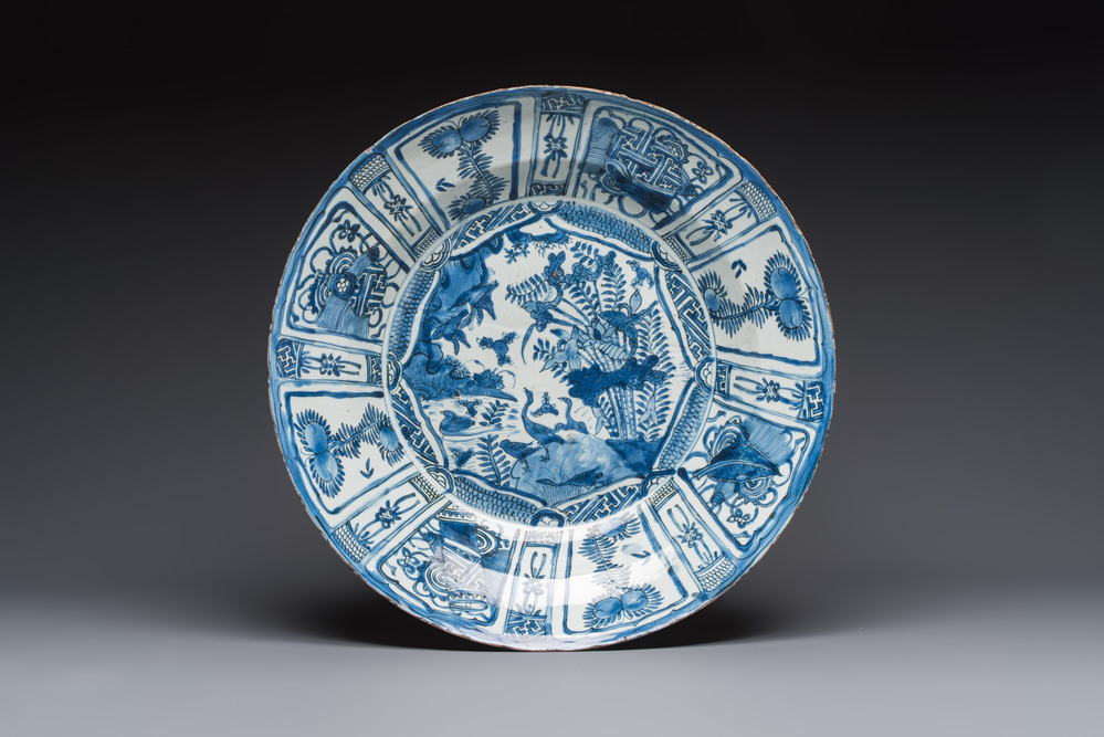A very large Chinese blue and white 'Kraak' dish with geese by the water, Wanli