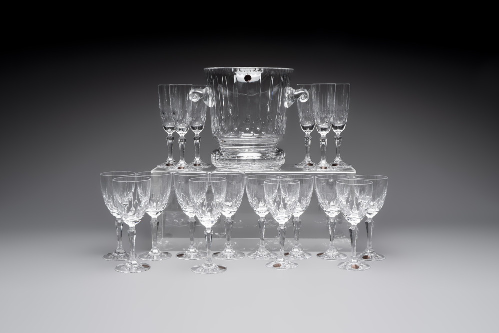 A French crystal wine cooler, six champagne flutes, six wine glasses and six water glasses, in original Arnauld de Brissac boxes, 1970s