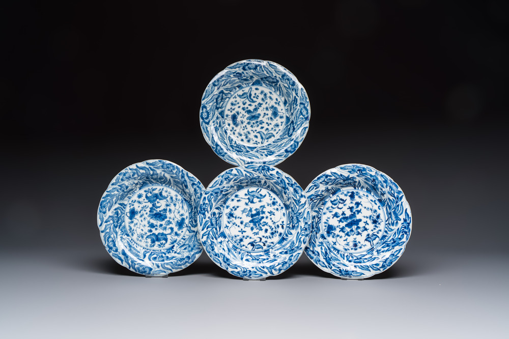 Four Chinese blue and white moulded plates with floral design, Kangxi