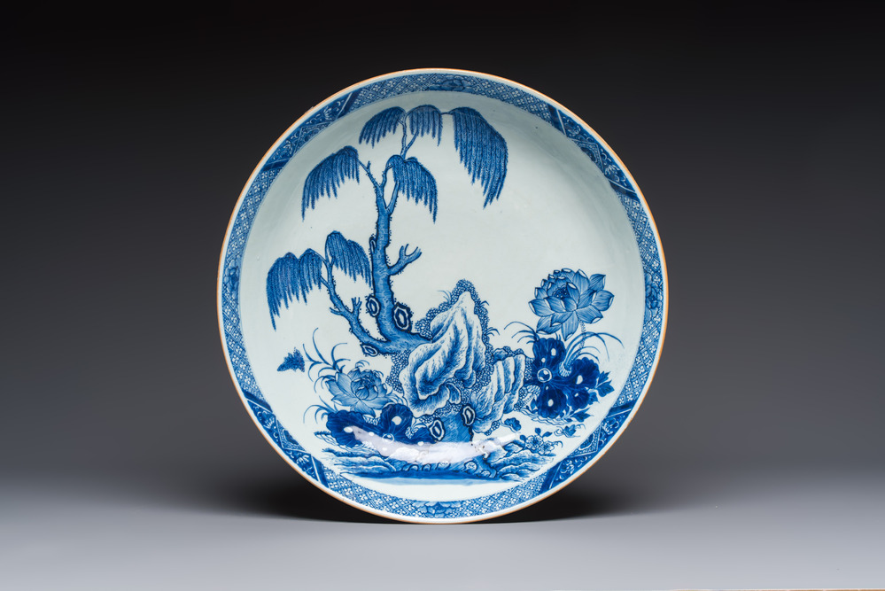 A Chinese blue and white 'Willow and Lotus' dish, Qianlong