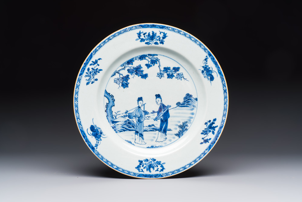A Chinese blue and white 'Elegant Ladies in a Garden' dish, Qianlong