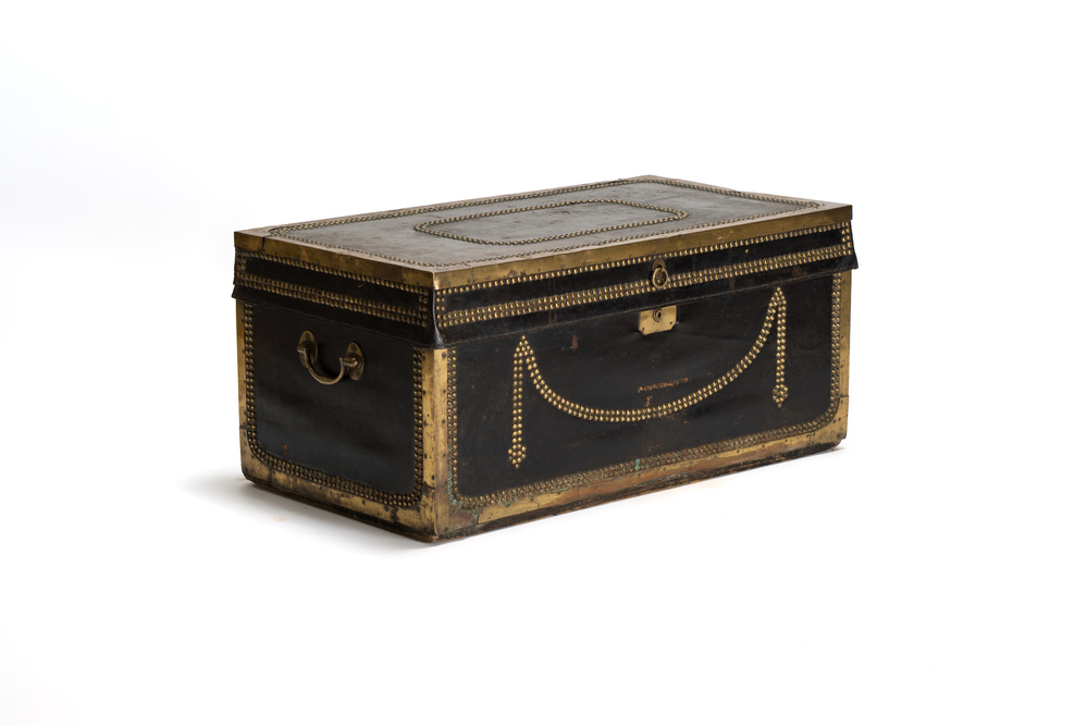 A Chinese export brass-bound black leather travel trunk, 19th C.
