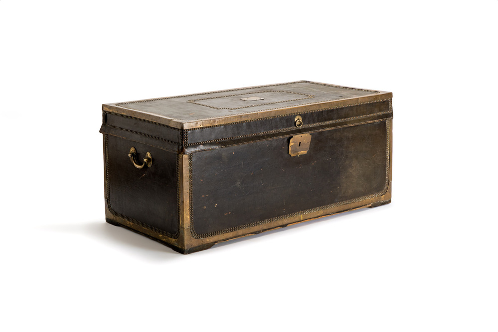 A large Chinese export brass-bound black leather travel trunk with engraved 'H.H.J. Coops' plaque, 19th C.