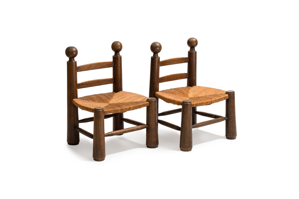 A pair of chairs in oak and straw, attributed to Charles Dudouyt, France, mid 20th C.