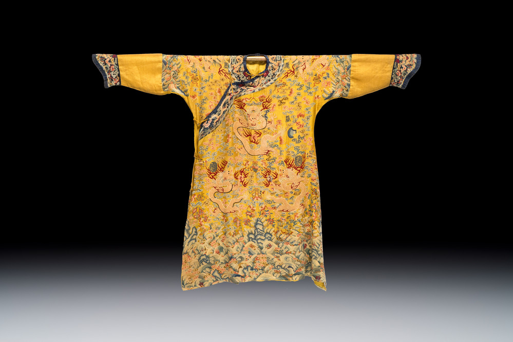 A Chinese imperial yellow-ground embroidered silk 'Nine Symbols' lady's 'Dragon' robe, 'Ji Fu' 吉服, 19th C.
