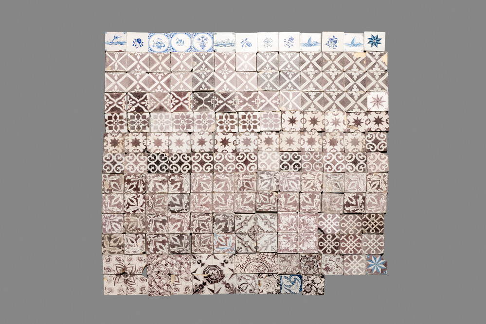 166 blue, white and manganese Dutch Delft tiles, 18th C.