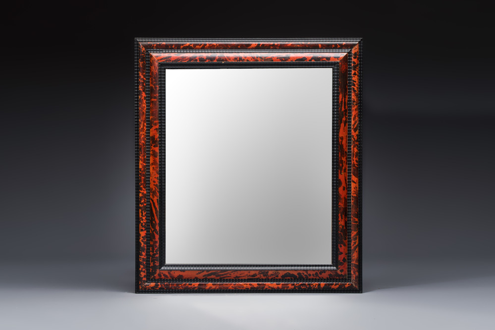 A large rectangular tortoiseshell-veneered and ebonised wood frame with later mirror, probably Flanders, 19th C.