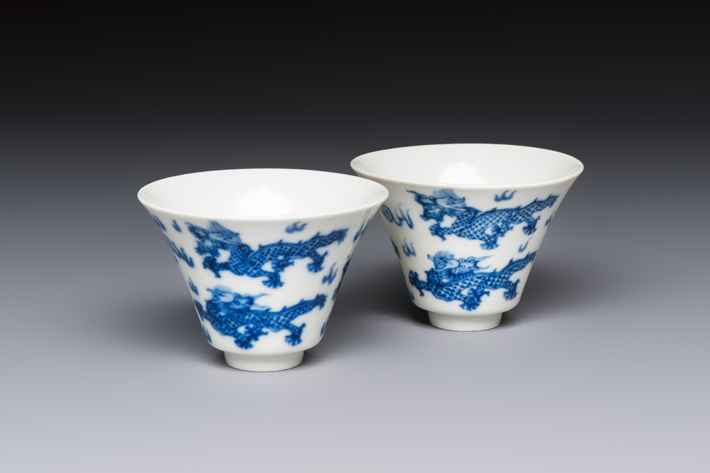 A pair of Chinese blue and white 'Bleu de Hue' 'Dragon' cups, Nhuoc Tham Tran Tang 若深珍藏 mark, 19th C.