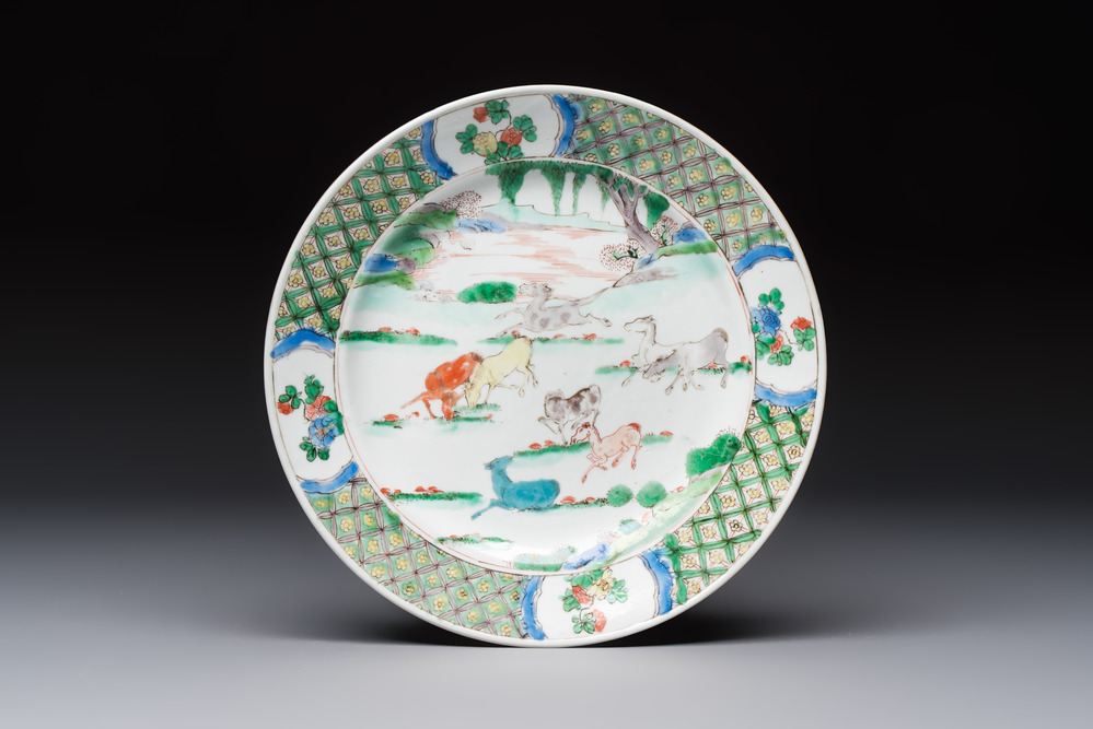 A Chinese famille verte 'Eight Horses' plate, Kangxi