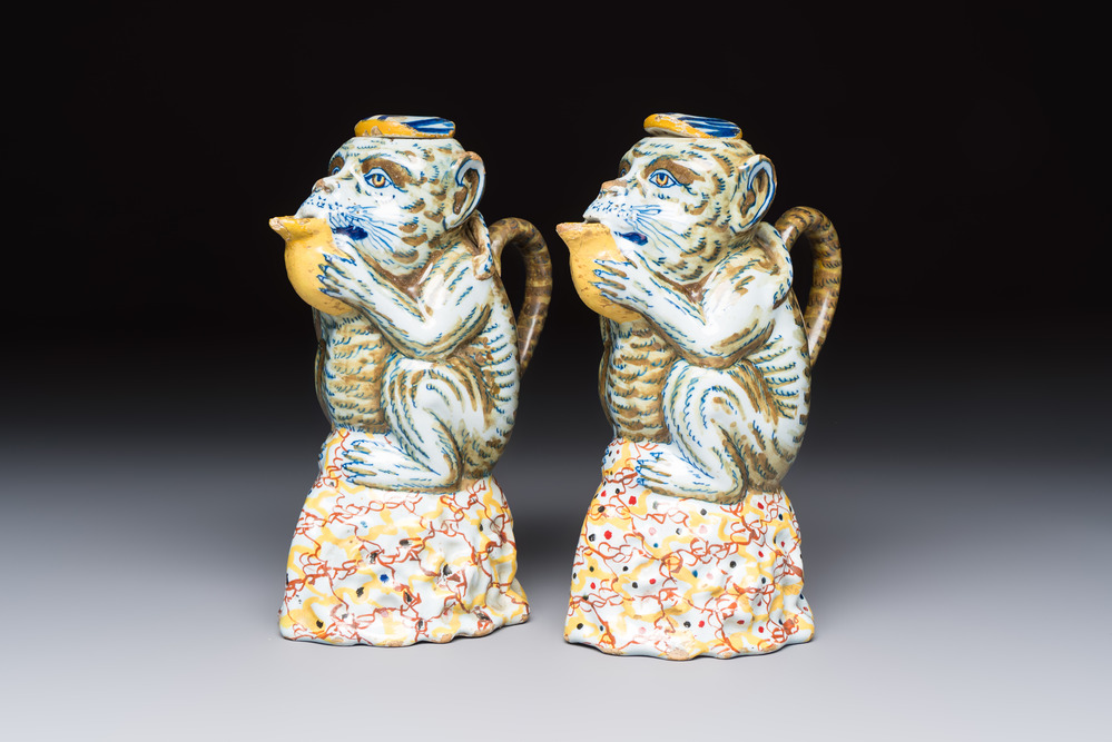 A pair of polychrome Dutch Delft monkey ewers and covers, 18th C.