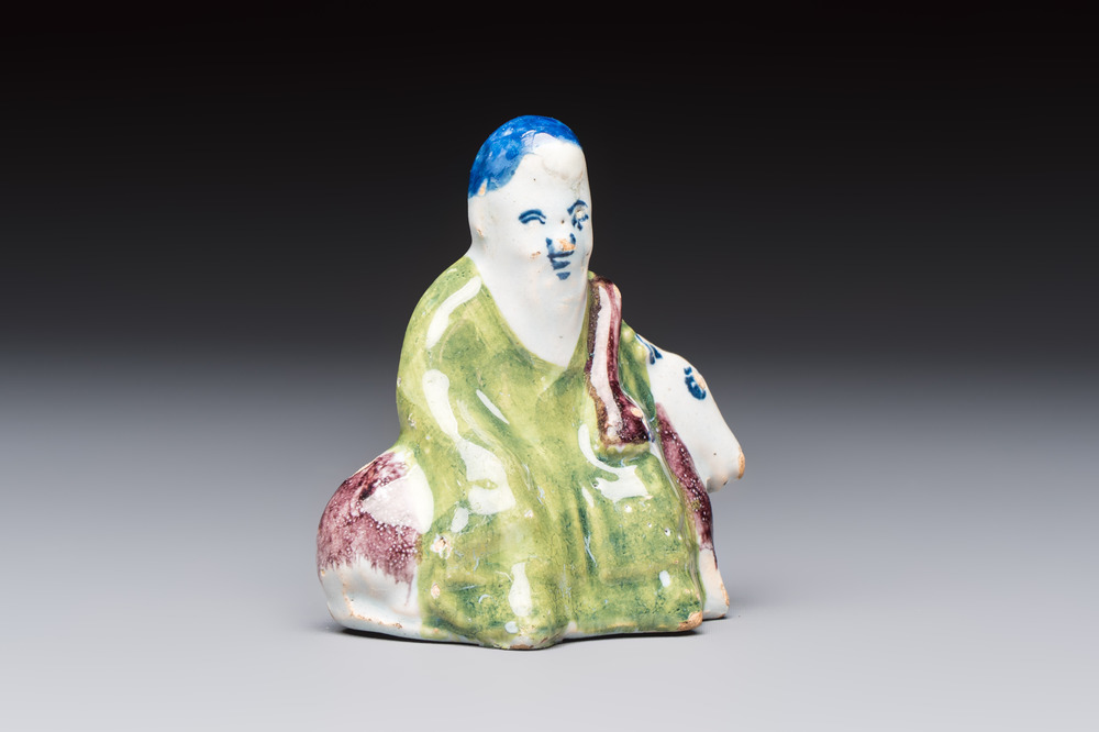 A polychrome Dutch Delft chinoiserie model of Shou Lao on a deer, 18th C.