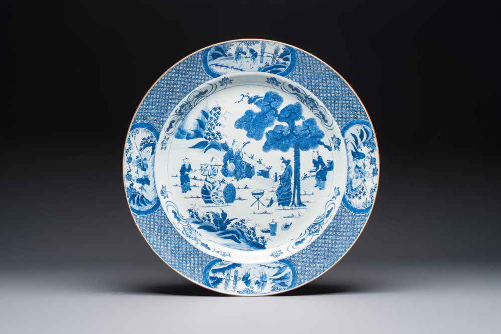 A massive Chinese blue and white 'Music-Making Scholars' dish, Yongzheng