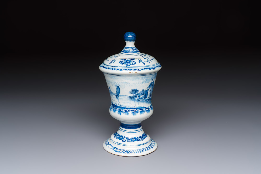 A blue and white inscribed Dutch Delft children's money bank, dated 1786