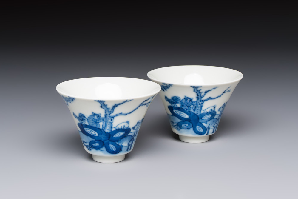 A pair of Chinese blue and white 'Bleu de Hue' cups with zodiac animals, Noi Phu 內府 mark, 19th C.