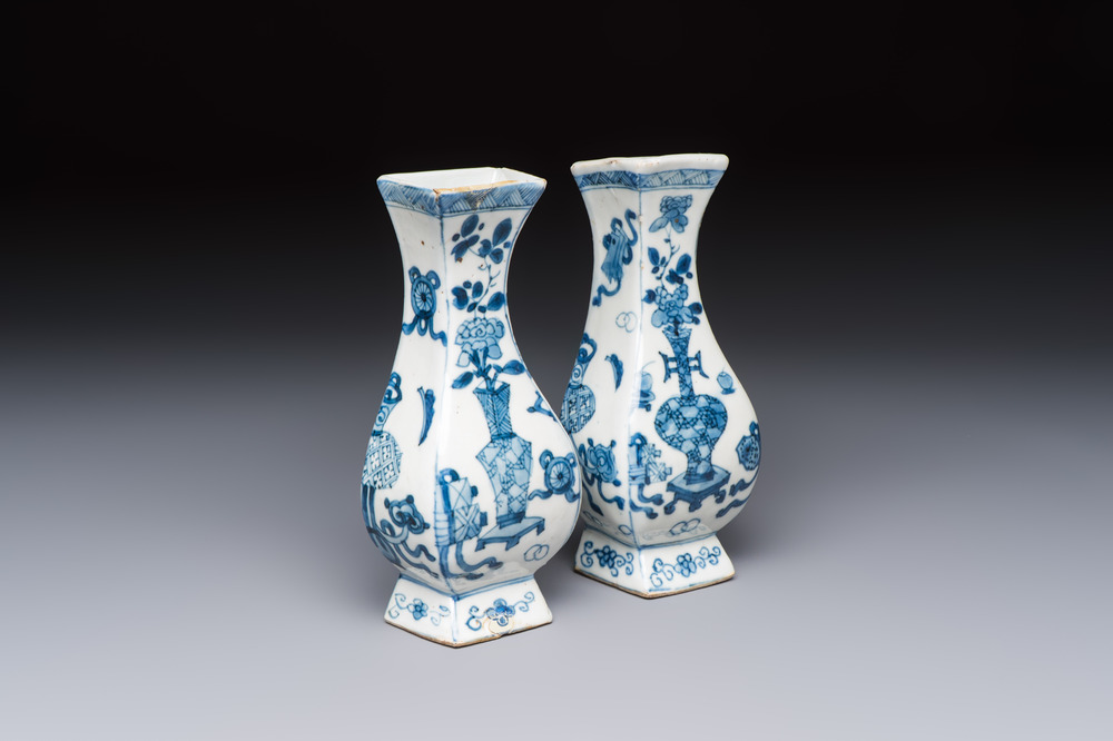 A pair of Chinese blue and white 'Antiquities' wall pocket vases, Kangxi