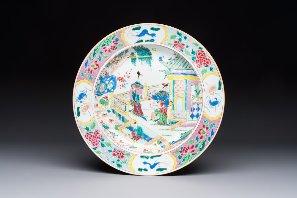 A fine Chinese famille rose dish with ladies and boys near a pagoda, Yongzheng