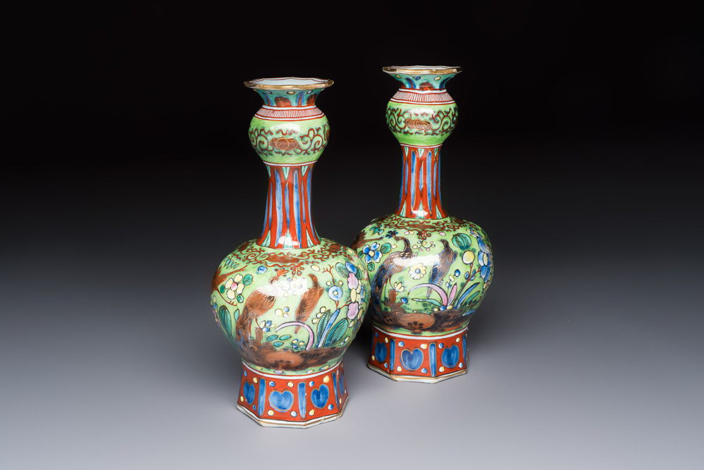 A pair of clobbered Dutch Delft vases, 17th C.