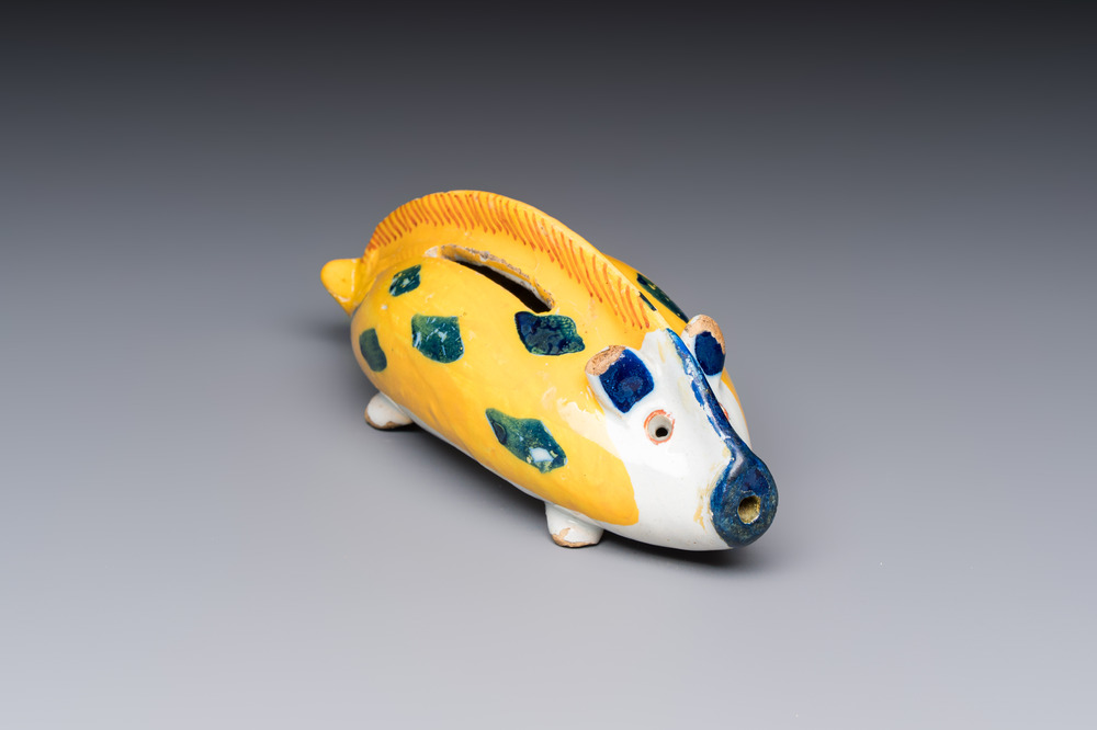 A polychrome Dutch Delft 'Wild Boar' money bank, 18th C.