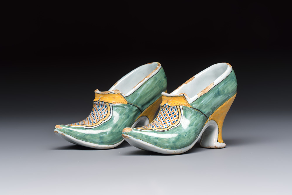 A pair of polychrome Dutch Delft models of shoes, 18th C.