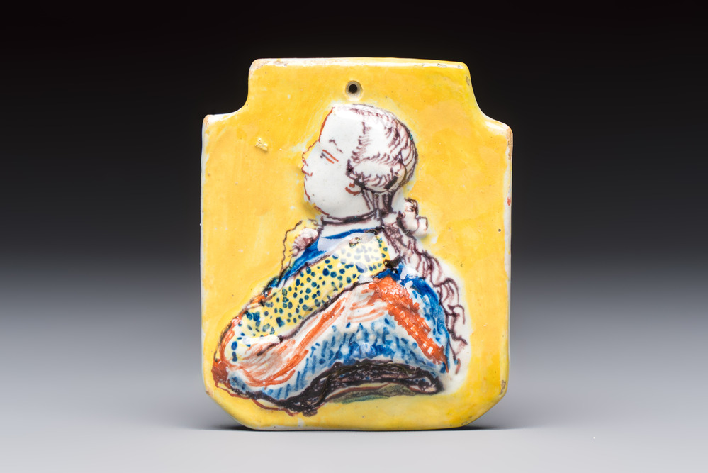 An extremely rare polychrome molded Dutch Delft orangist portrait plaque, 18th C.