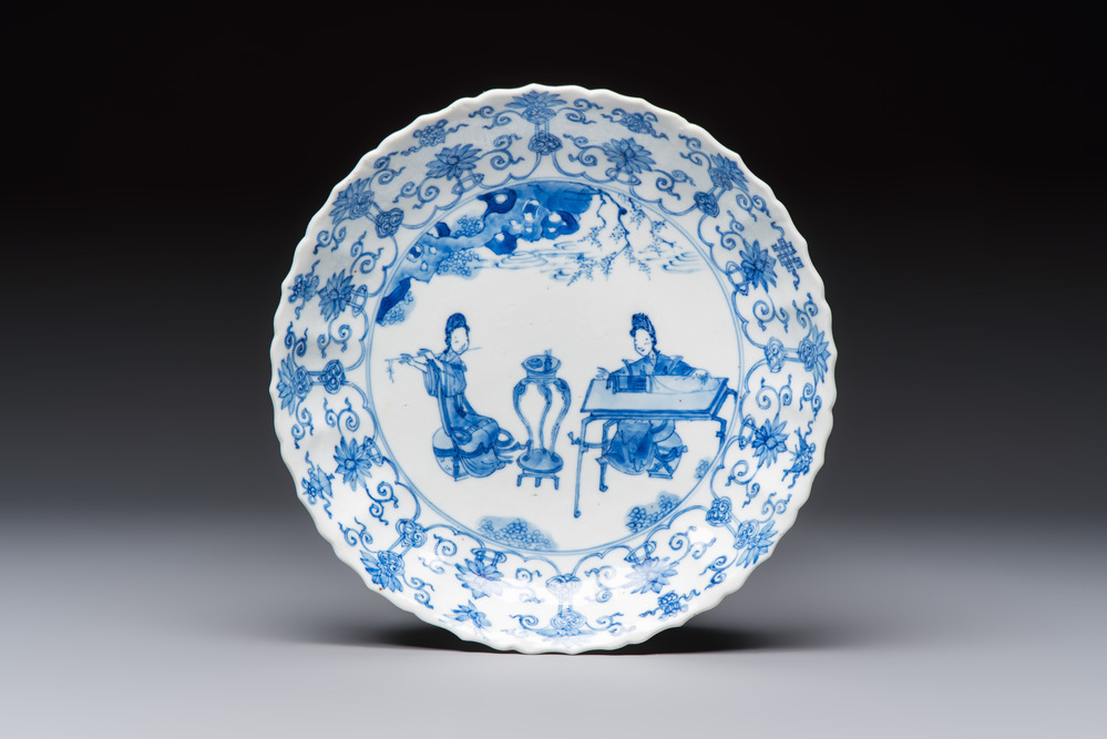 A Chinese blue and white 'Elegant Ladies Making Music' plate, Chenghua mark, Kangxi