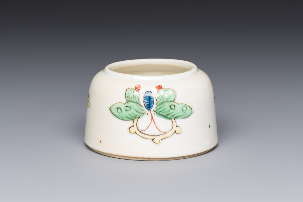 A Chinese famille verte 'Butterflies' water pot with relief design, Kangxi