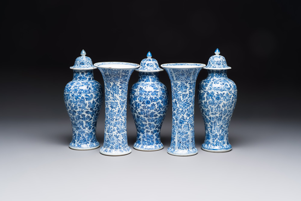 A Chinese blue and white five-piece garniture with floral design, Kangxi