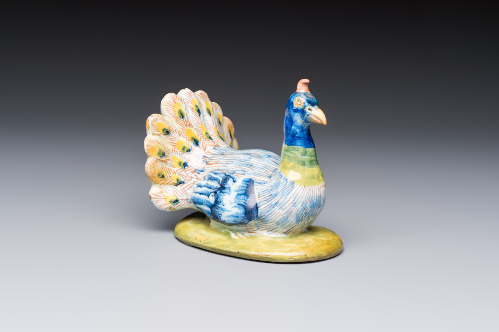 A polychrome Dutch Delft 'Peacock' cover, 18th C.