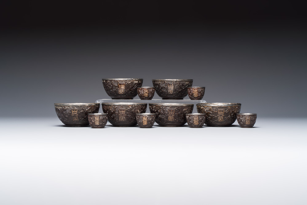 A group of 12 Chinese silver-lined coconut 'Shou 壽' bowls and cups, Wang Hengxin 王恆馨 marks, 19/20th C.