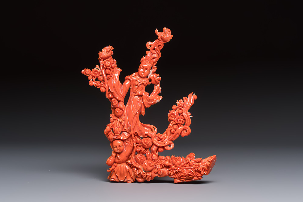 A Chinese carved red coral 'Goddess and Boy' group, 19/20th C.