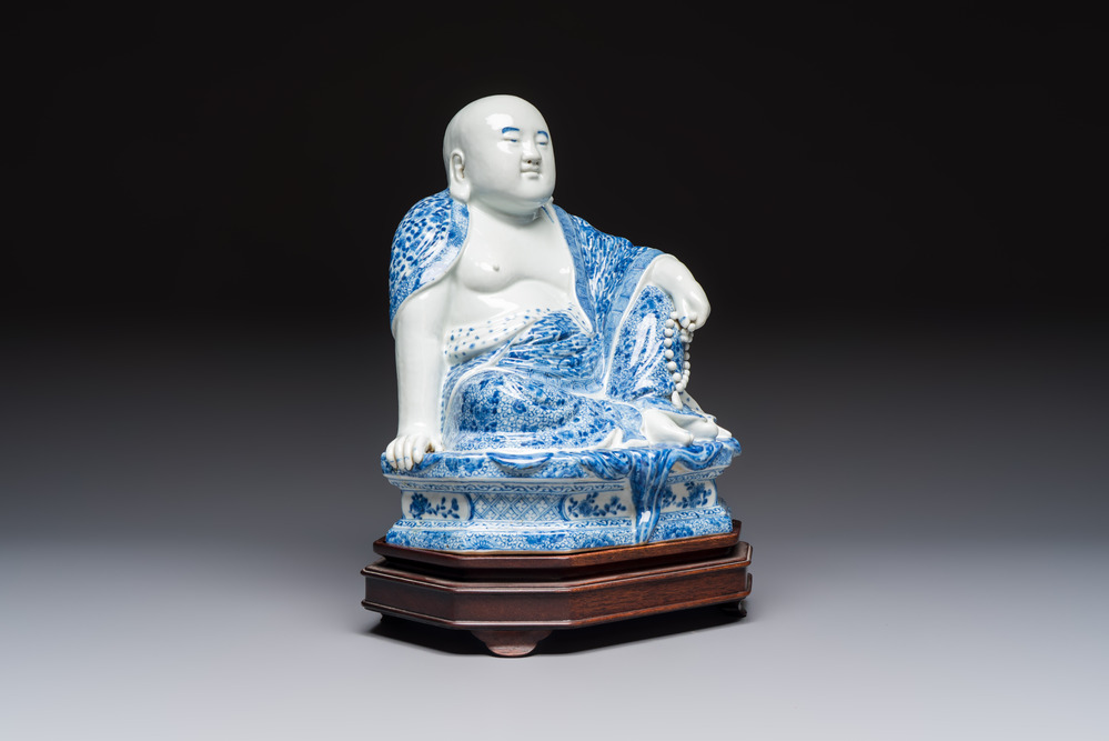 A fine Chinese blue and white Milefo Buddha on a wooden stand, Wei Hongtai Zao 魏洪泰造 mark, Republic