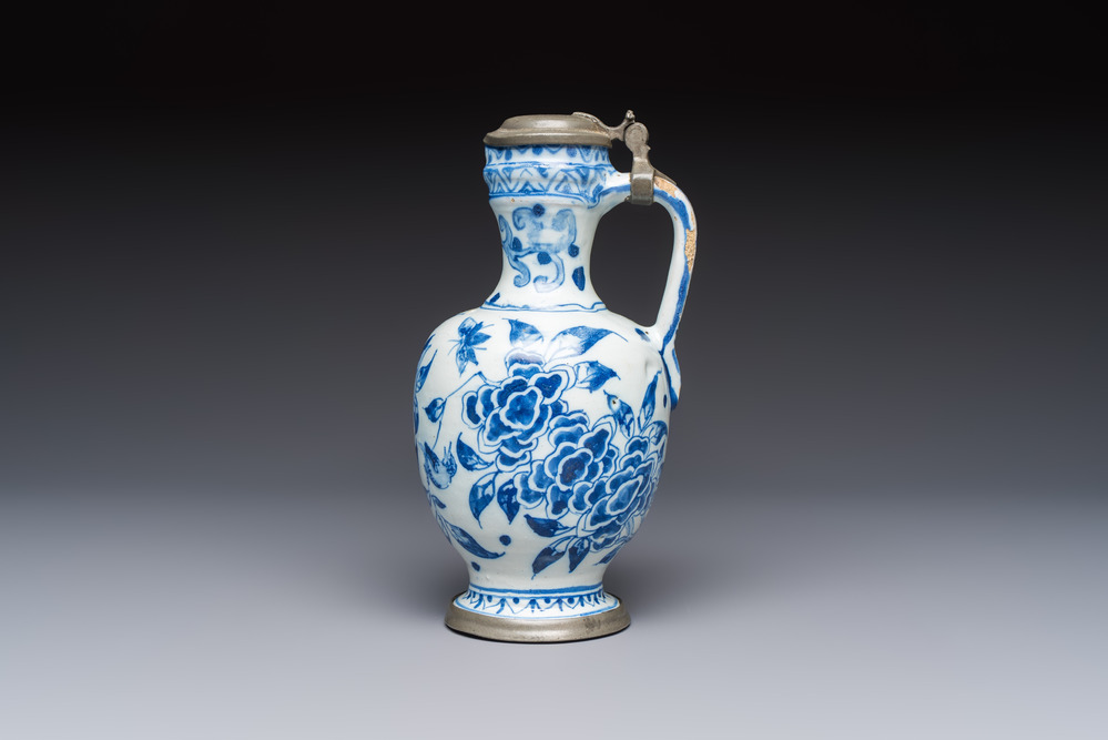 A blue and white pewter-mounted Delftware chinoiserie ewer, probably London, 17th C.